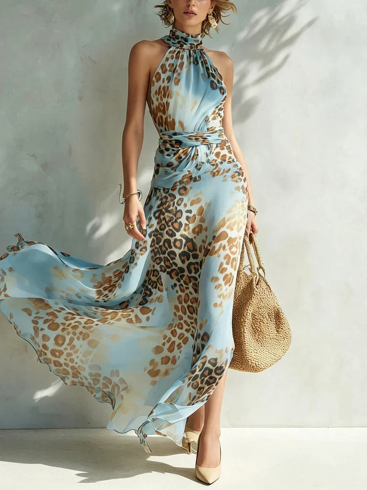 Woman wearing leopard print halter neck maxi dress