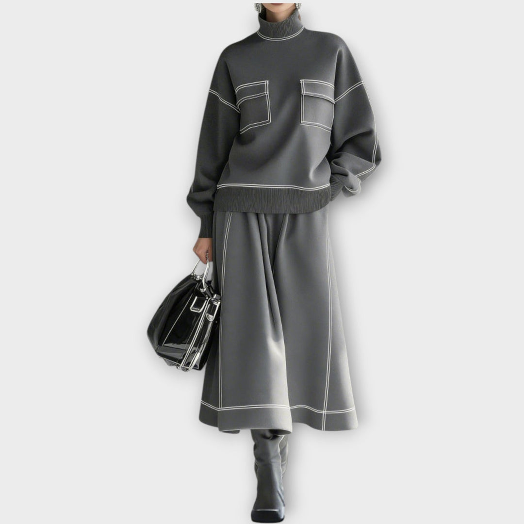 Woman wearing charcoal gray mock neck two-piece set