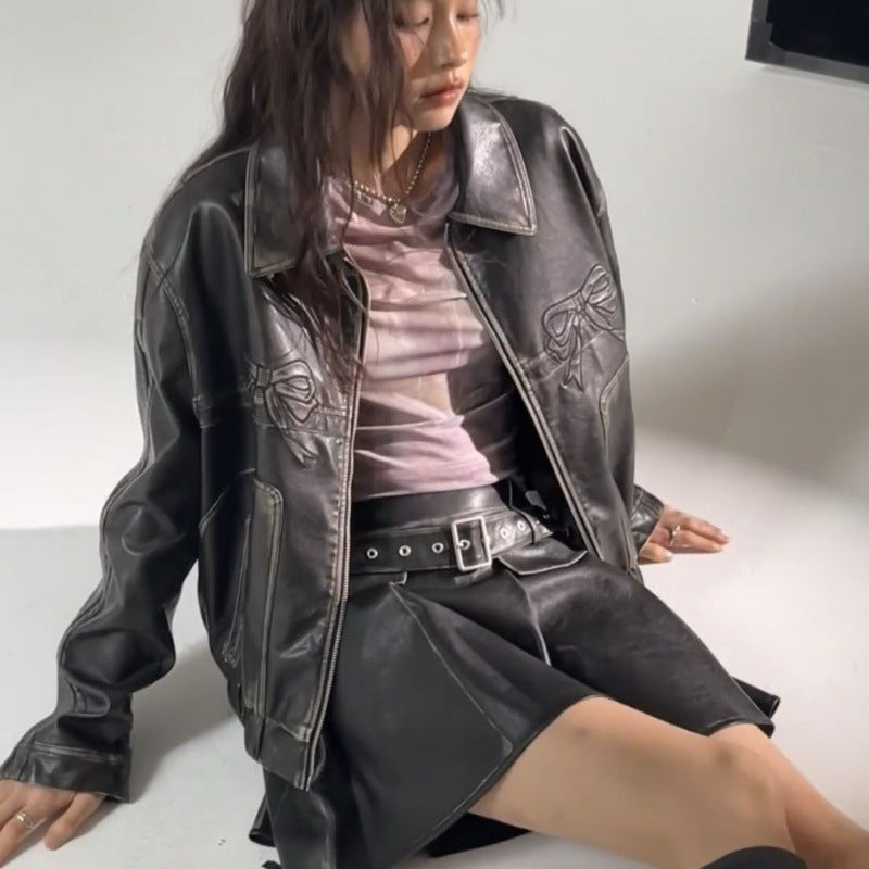 Women's pink bow biker jacket with long sleeves