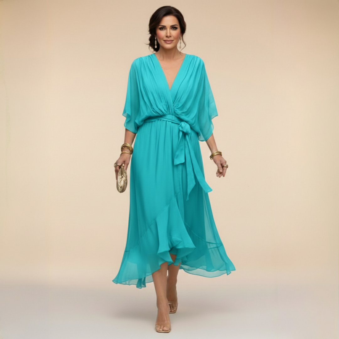 Woman wearing flowy V-neck dress outdoors