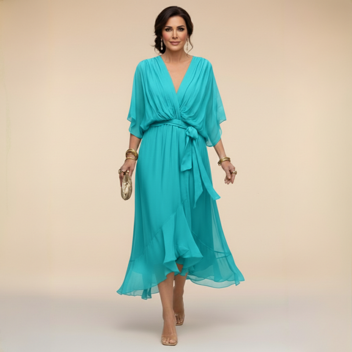 Woman wearing flowy V-neck dress outdoors