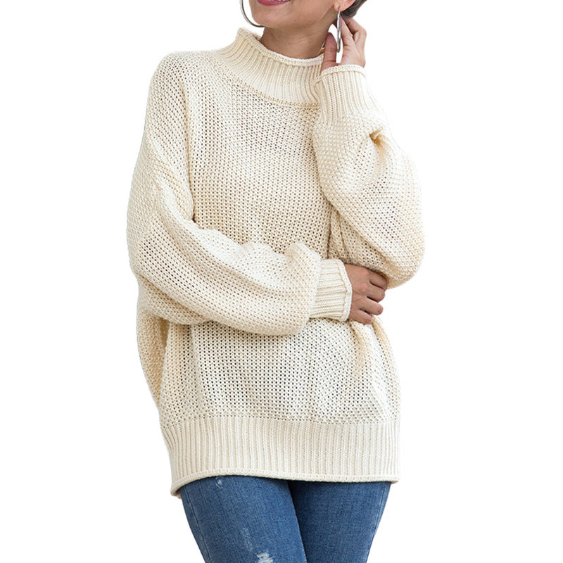Women's loose turtleneck knit sweater front view