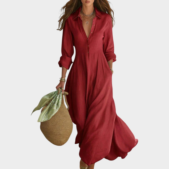 Woman in button front maxi dress with long sleeves