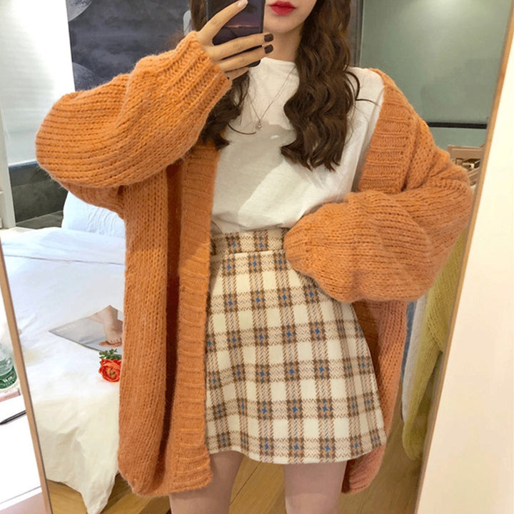 Woman wearing thick knit relaxed fit sweater