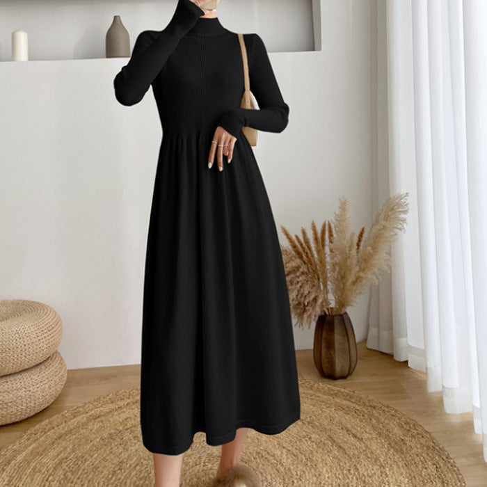 Women's mid-length knit sweater dress with elastic waist