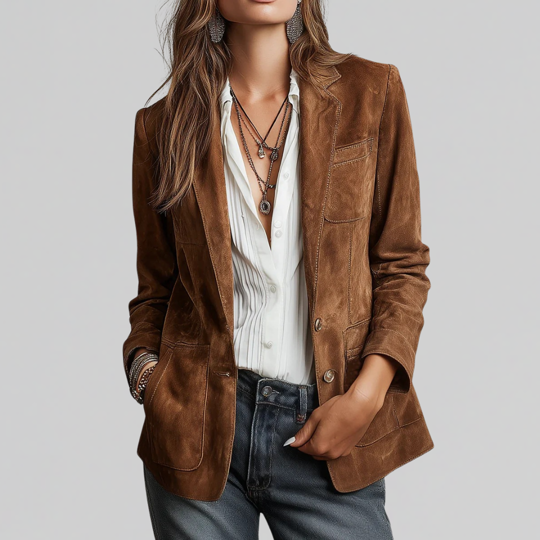 Woman wearing tailored relaxed fit blazer in cognac brown