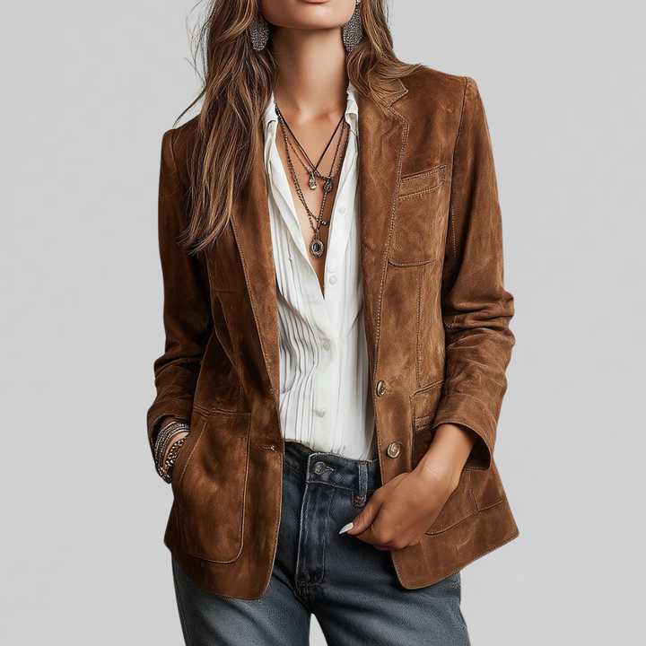 Woman wearing tailored relaxed fit blazer in cognac brown