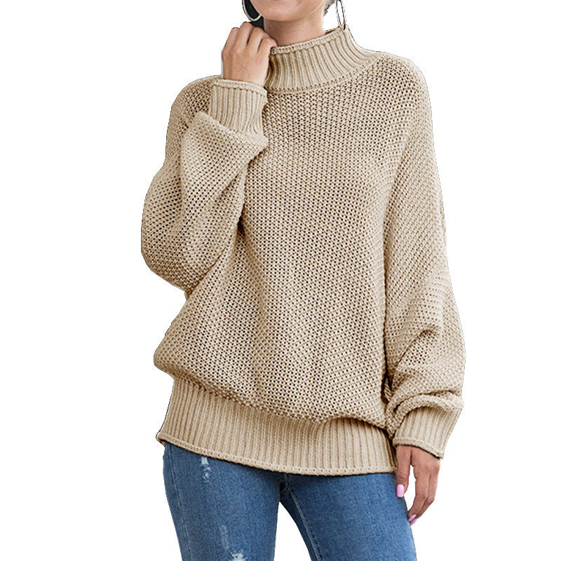 Women's loose turtleneck knit sweater front view