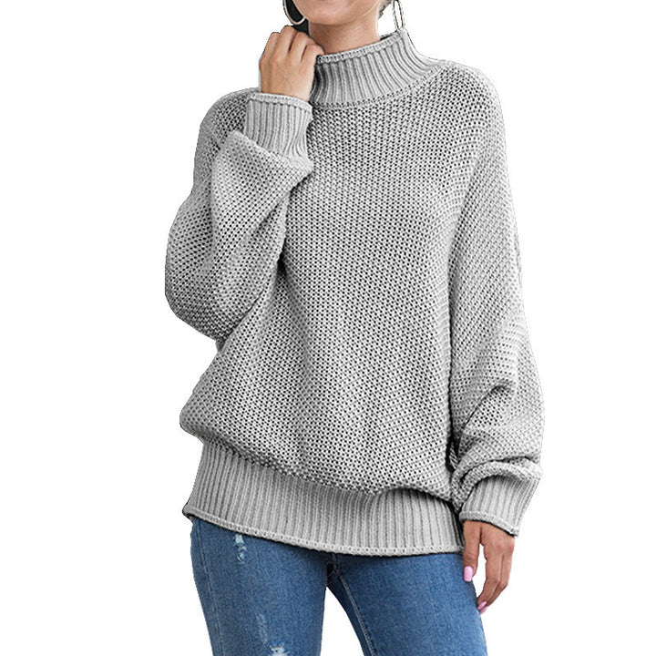 Women's loose turtleneck knit sweater front view