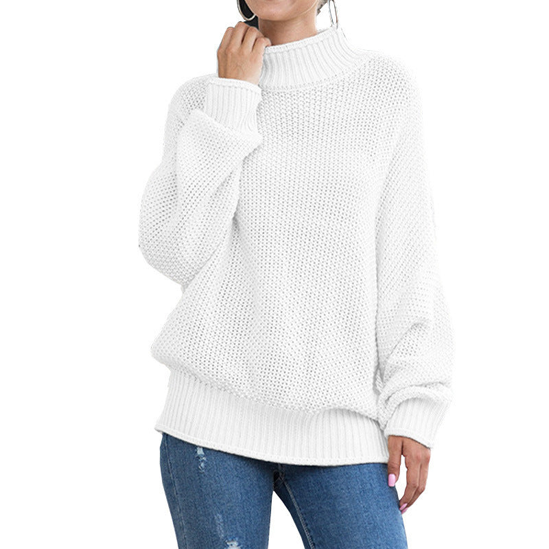 Women's loose turtleneck knit sweater front view