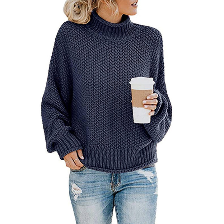 Women's loose turtleneck knit sweater front view