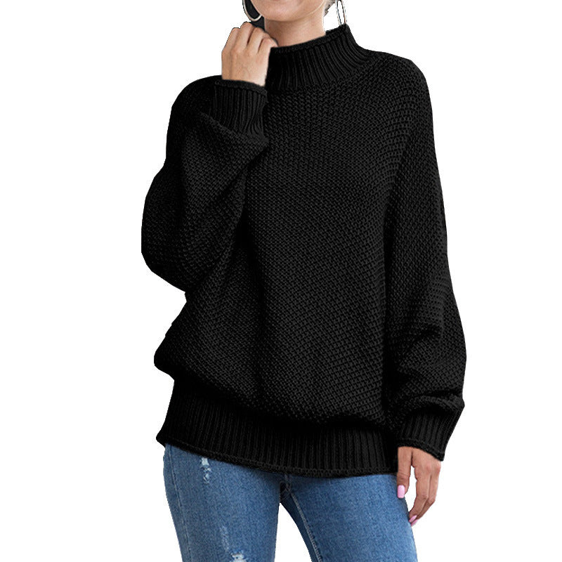 Women's loose turtleneck knit sweater front view