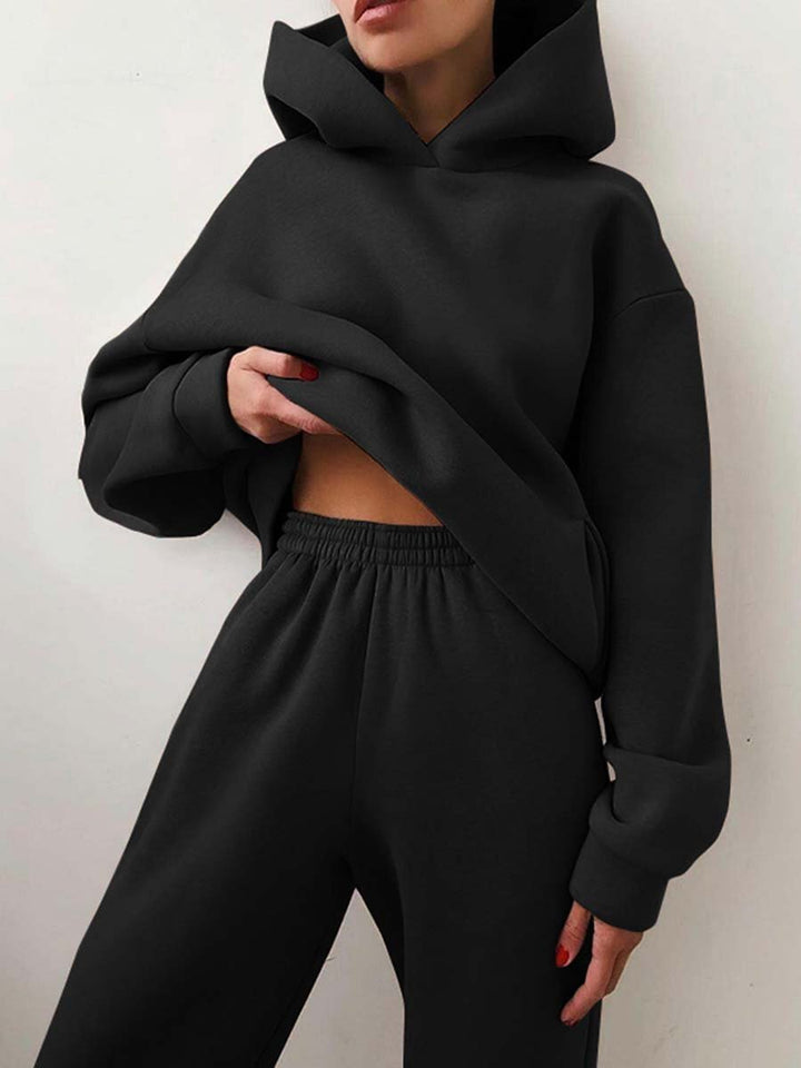 Woman wearing a hooded jogger set with elastic waist – detail view 17