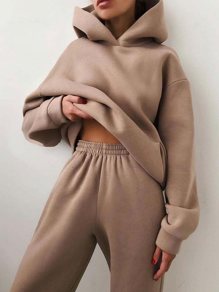 Woman wearing a hooded jogger set with elastic waist – detail view 13