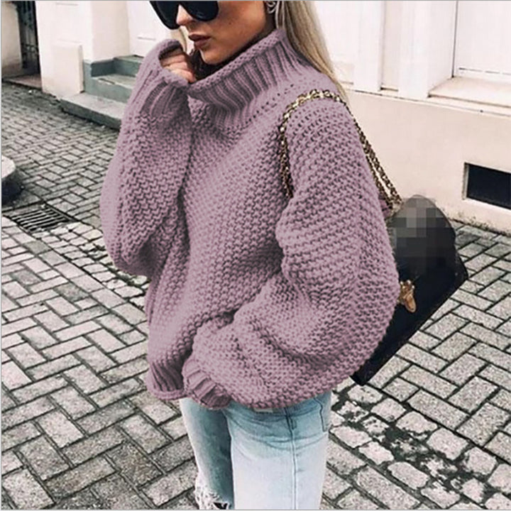 Women's loose turtleneck knit sweater front view