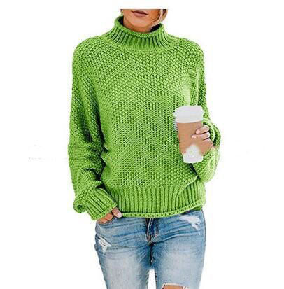 Women's loose turtleneck knit sweater front view