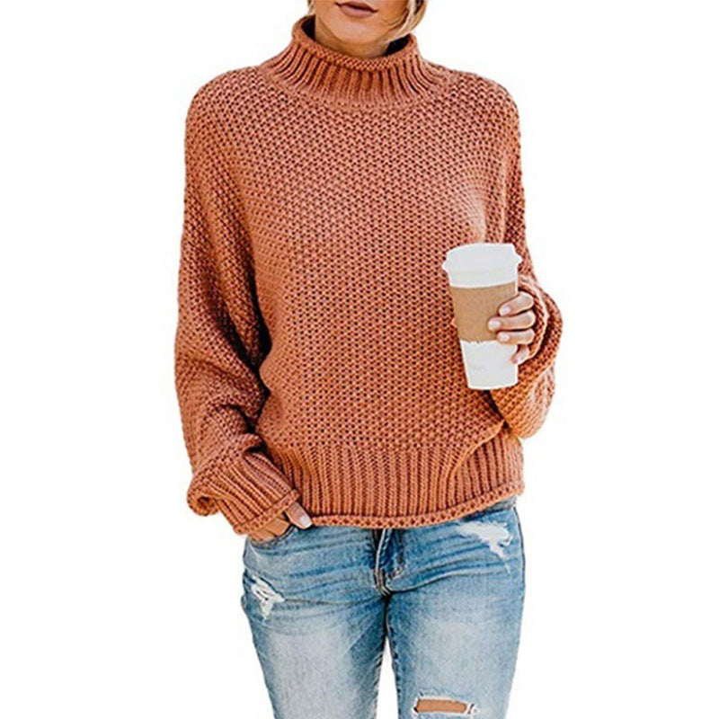 Women's loose turtleneck knit sweater front view