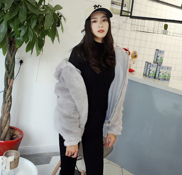 Women's white faux fur coat with sequin detailing