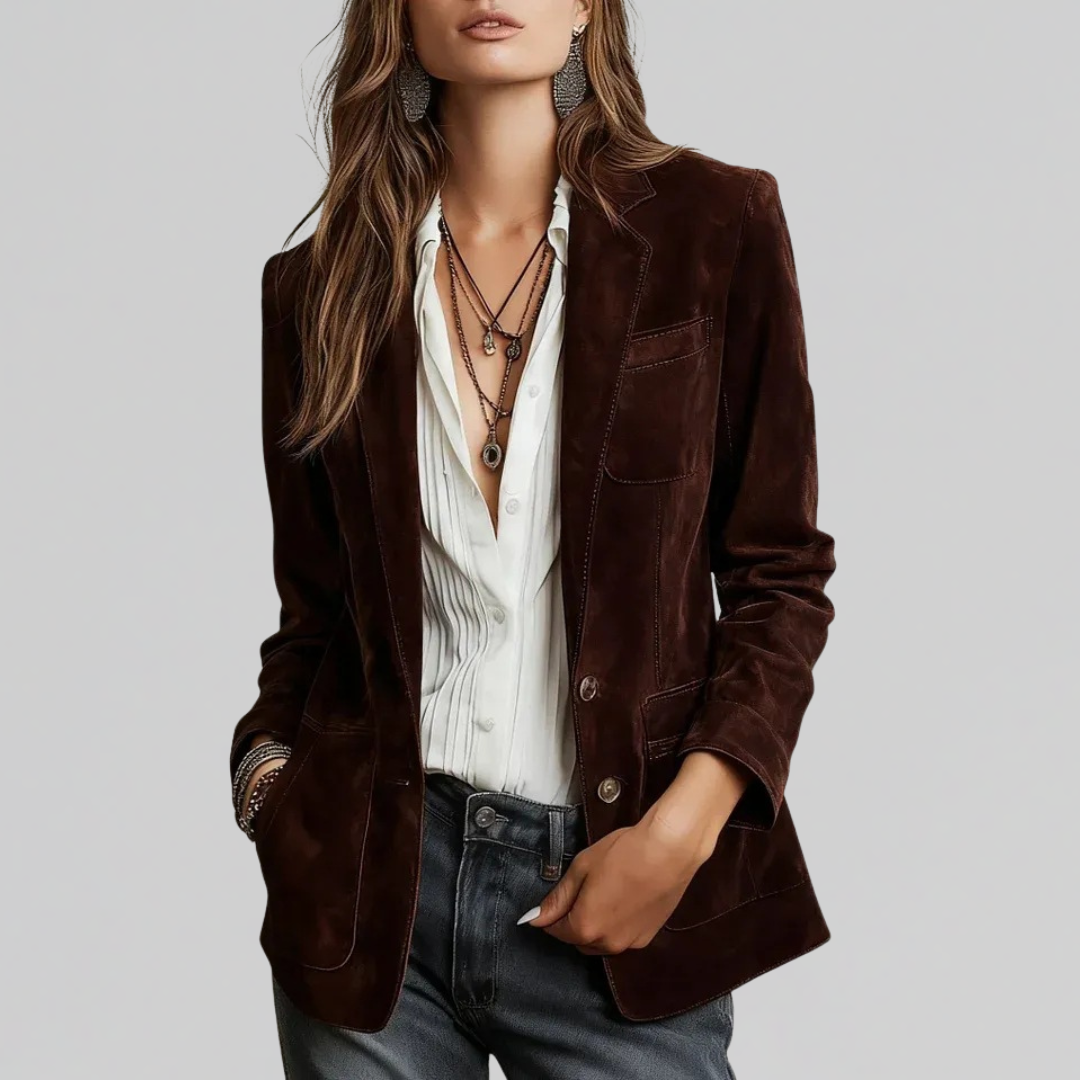 Woman wearing tailored relaxed fit blazer in cognac brown