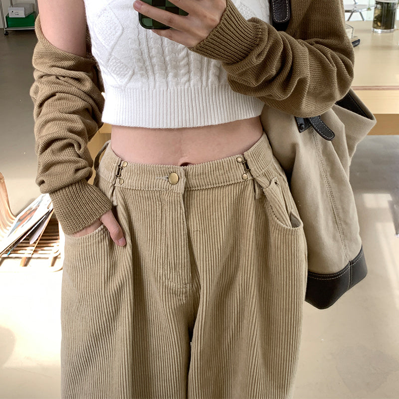 Woman wearing high waist wide leg pants in black