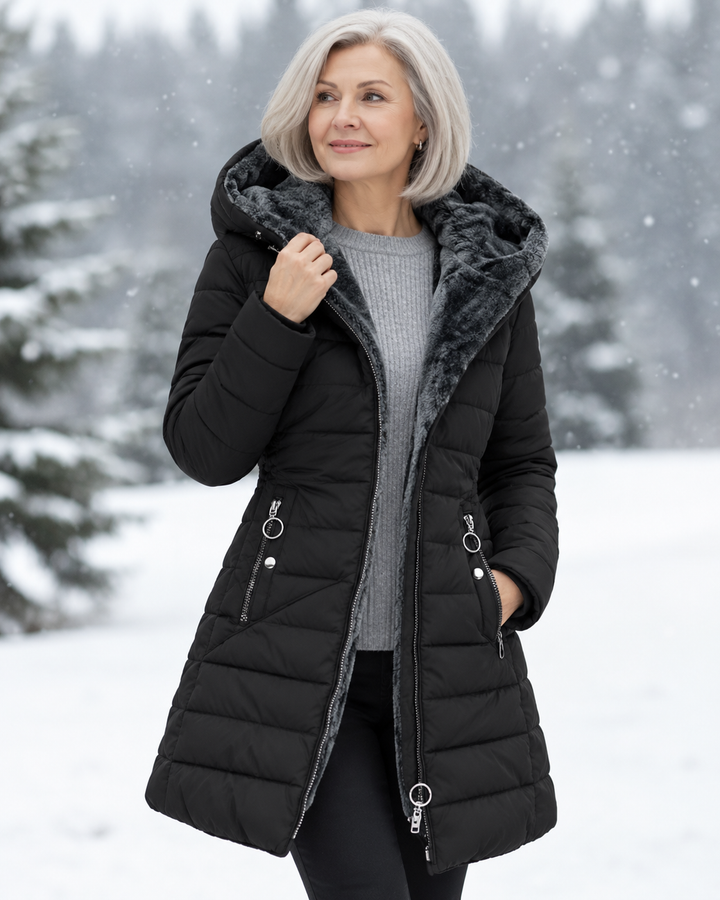 Women's quilted winter coat with hood on model