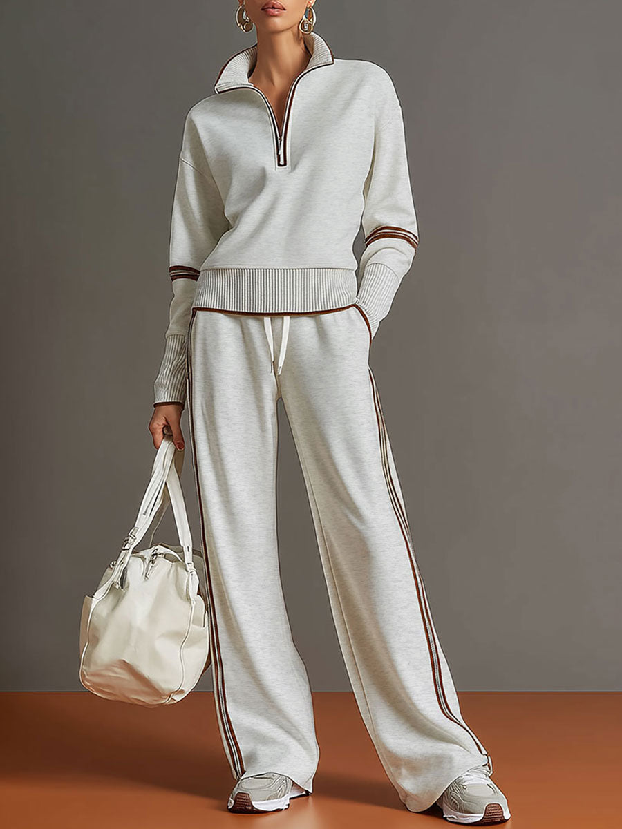 Woman wearing relaxed two piece wide leg set with blouse