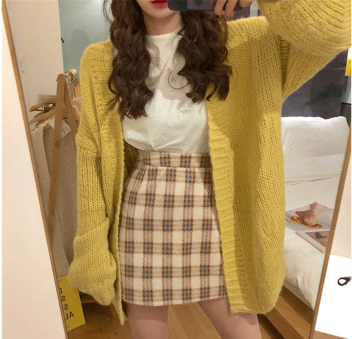 Woman wearing thick knit relaxed fit sweater