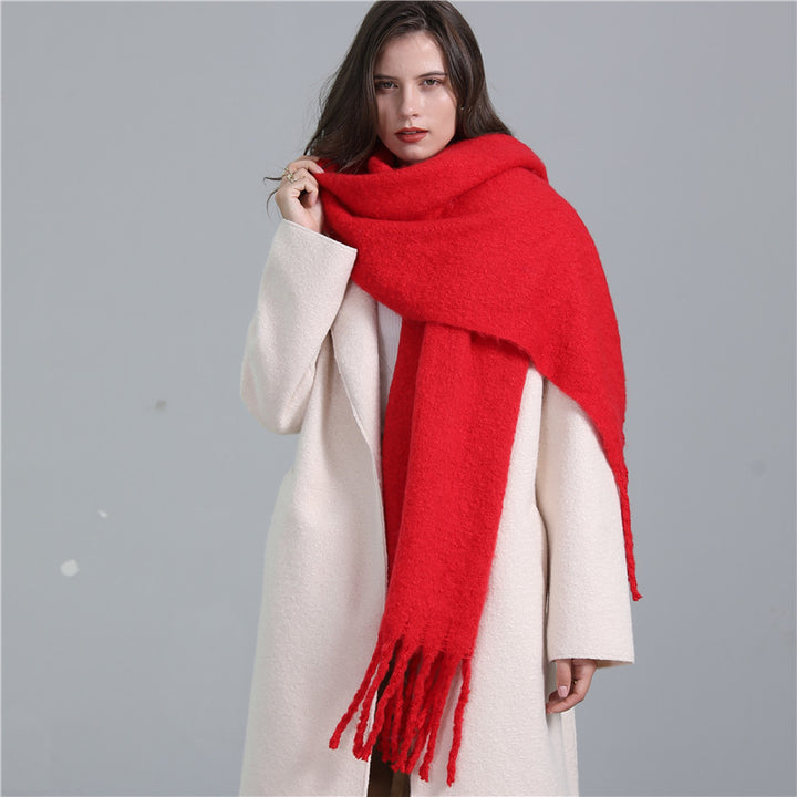 Women's long solid color winter scarf with tassel ends