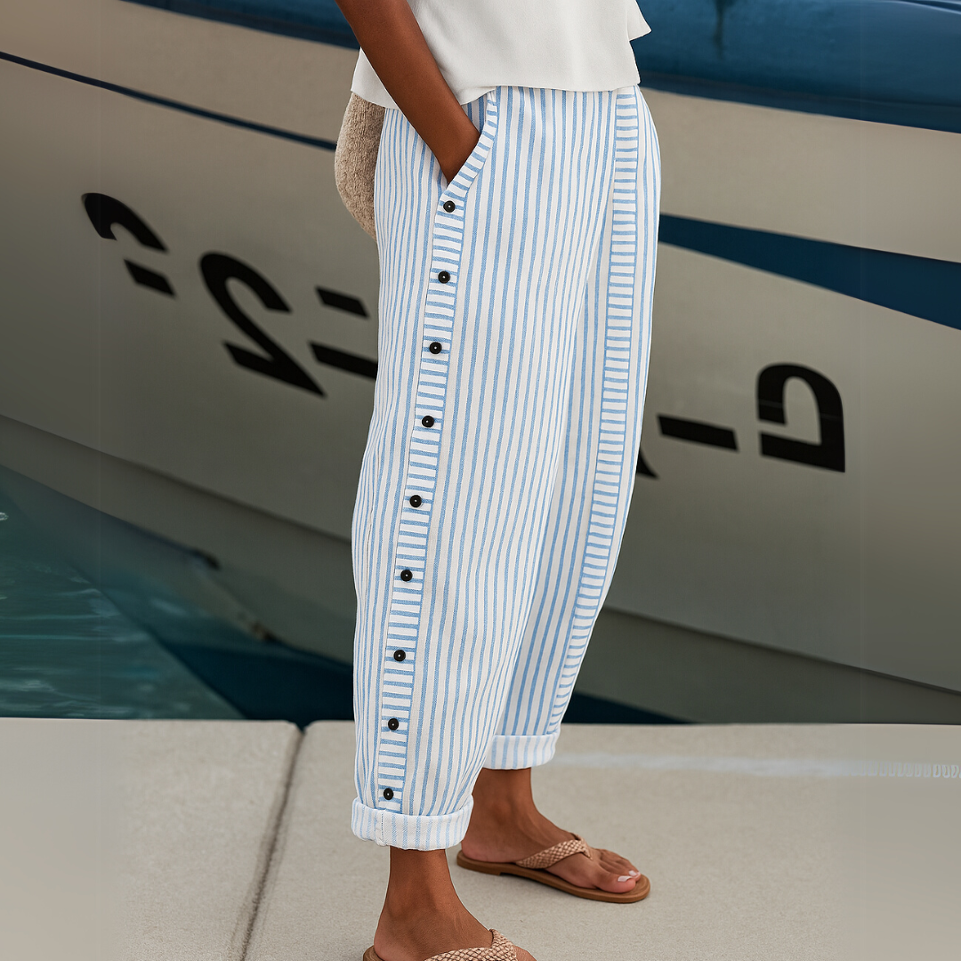 Woman wearing striped high-waisted button pants