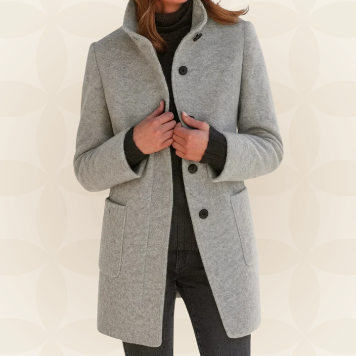 Woman wearing straight-cut winter coat with high collar