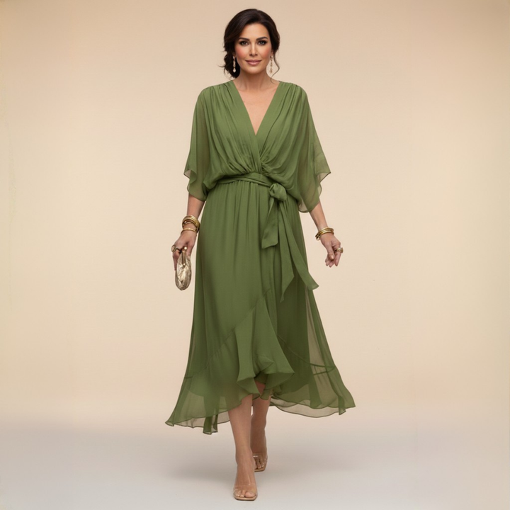 Woman wearing flowy V-neck dress outdoors