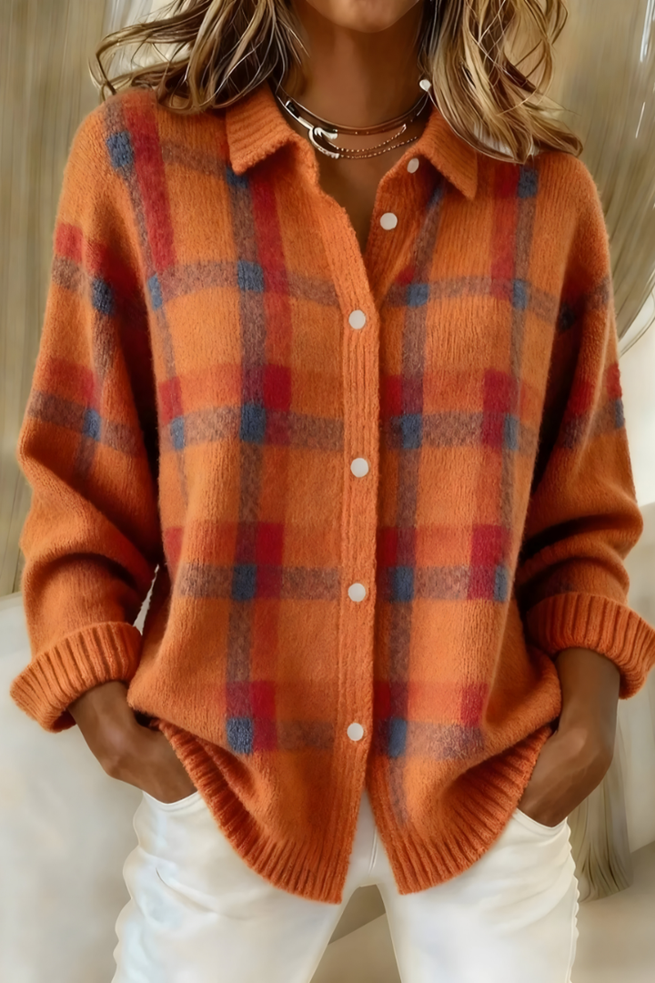 Woman wearing oversized plaid button-up knit cardigan