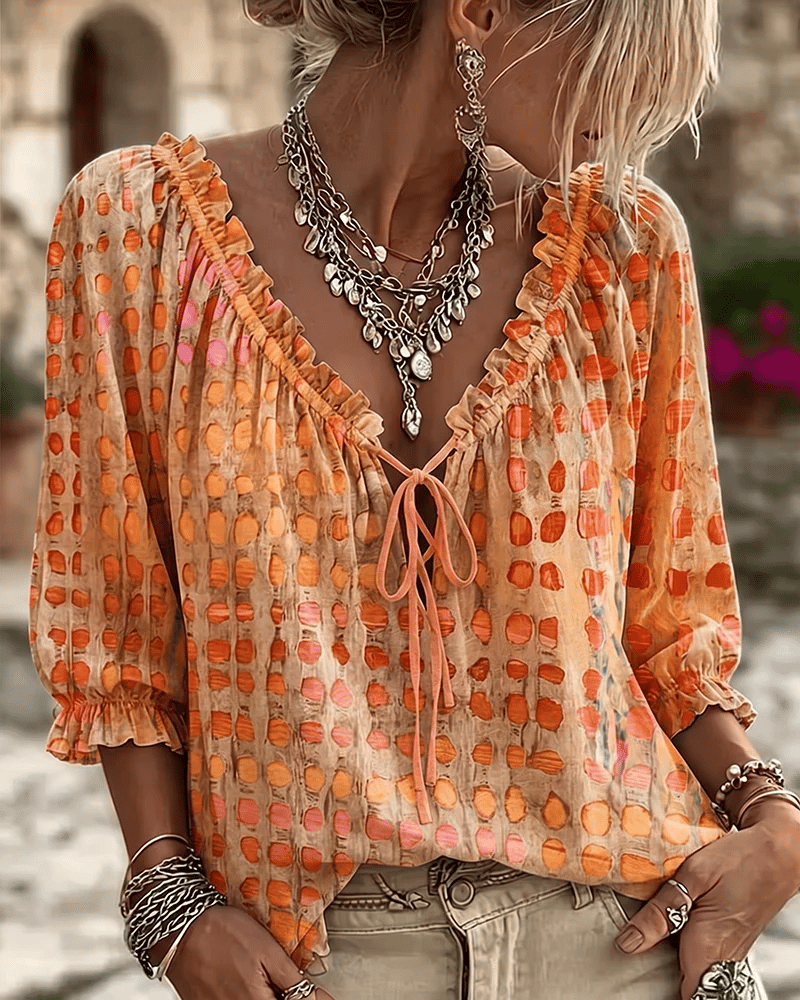 Women's polka dot blouse with lace-up V-neck