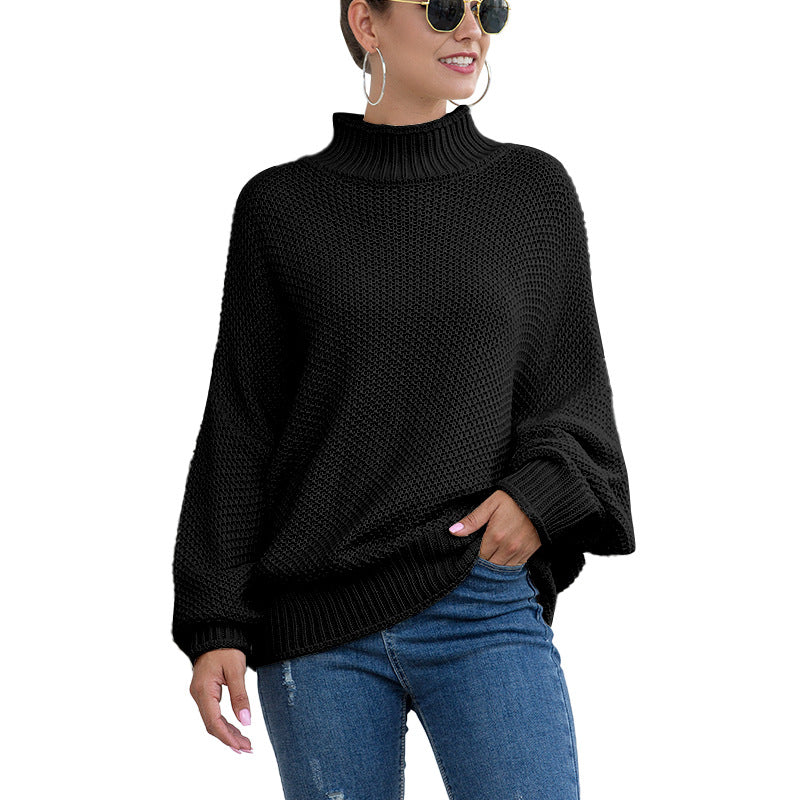 Women's loose turtleneck knit sweater front view