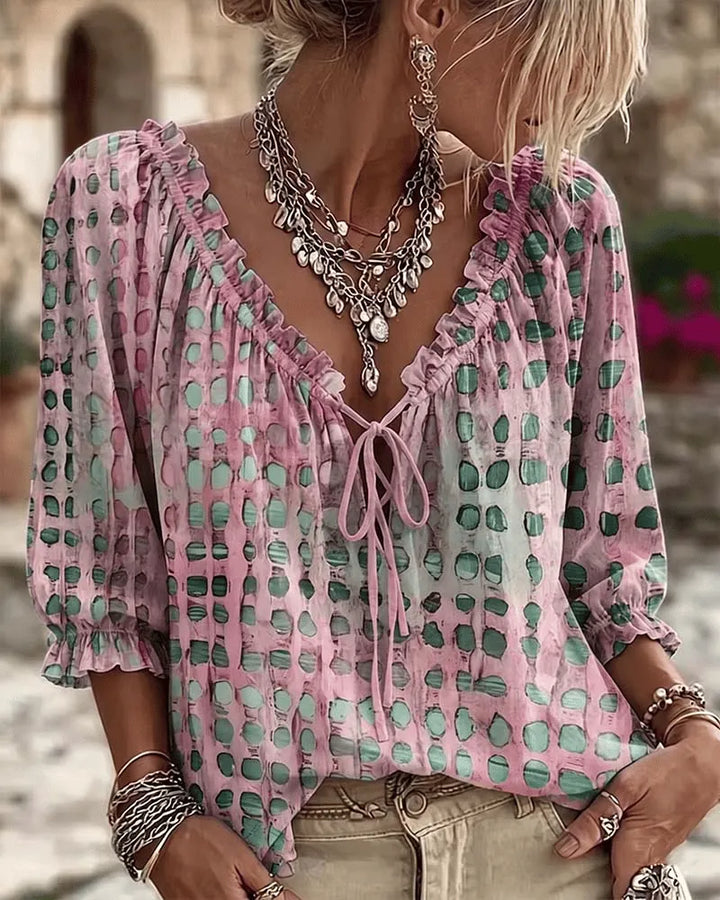 Women's polka dot blouse with lace-up V-neck