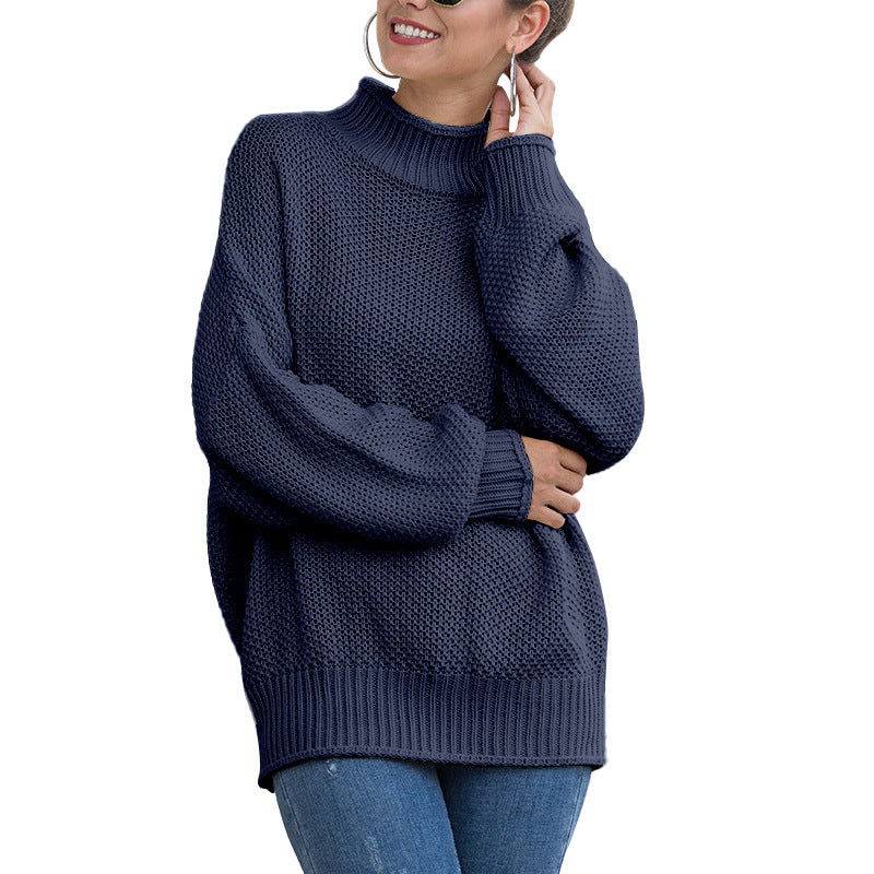 Women's loose turtleneck knit sweater front view