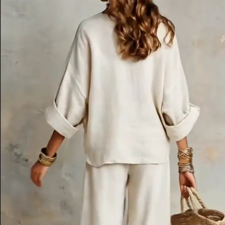 Woman wearing relaxed V-neck top and wide-leg pants set