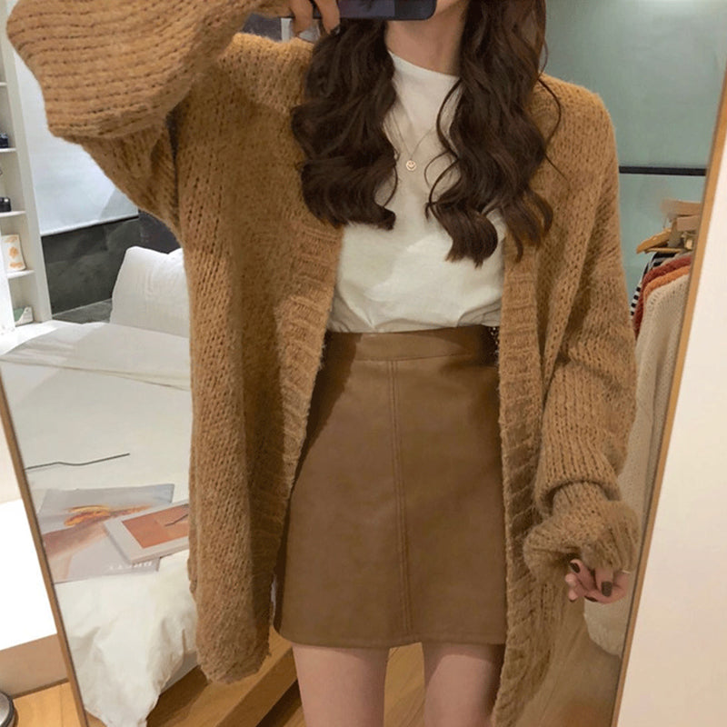 Woman wearing thick knit relaxed fit sweater