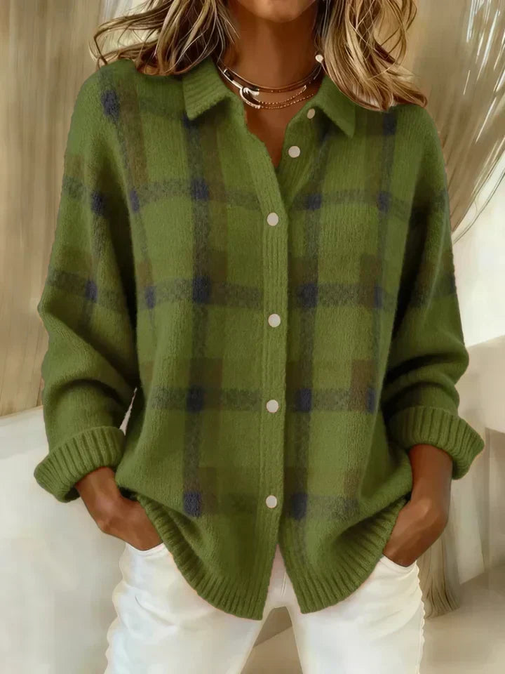 Woman wearing oversized plaid button-up knit cardigan