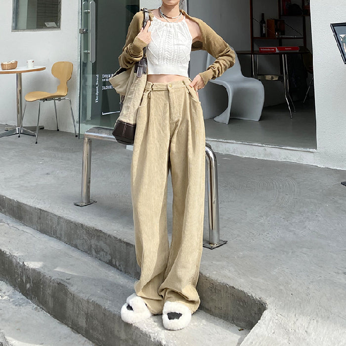 Woman wearing high waist wide leg pants in black