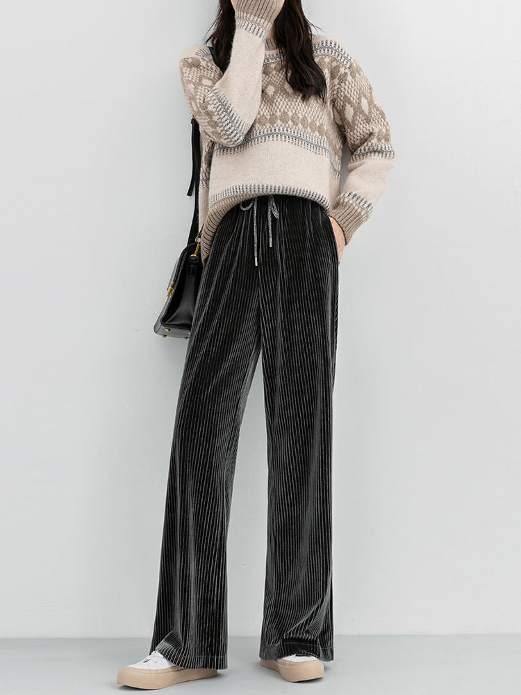 Woman wearing high waist corduroy wide leg pants