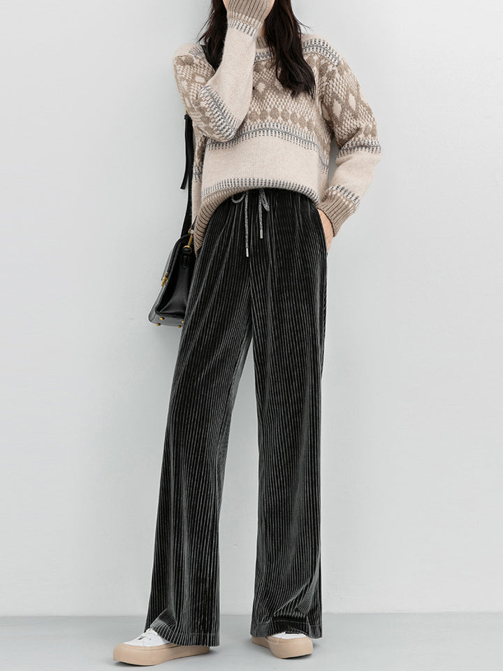 Woman wearing high waist corduroy wide leg pants