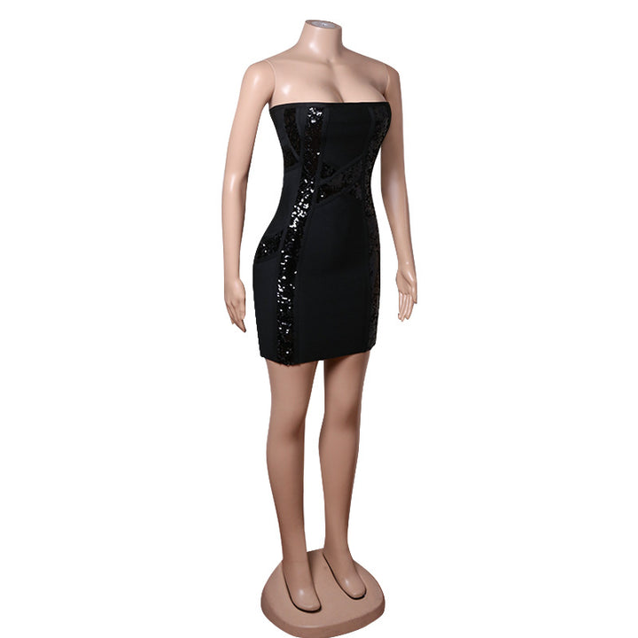 Woman wearing black sequin high waist mini skirt