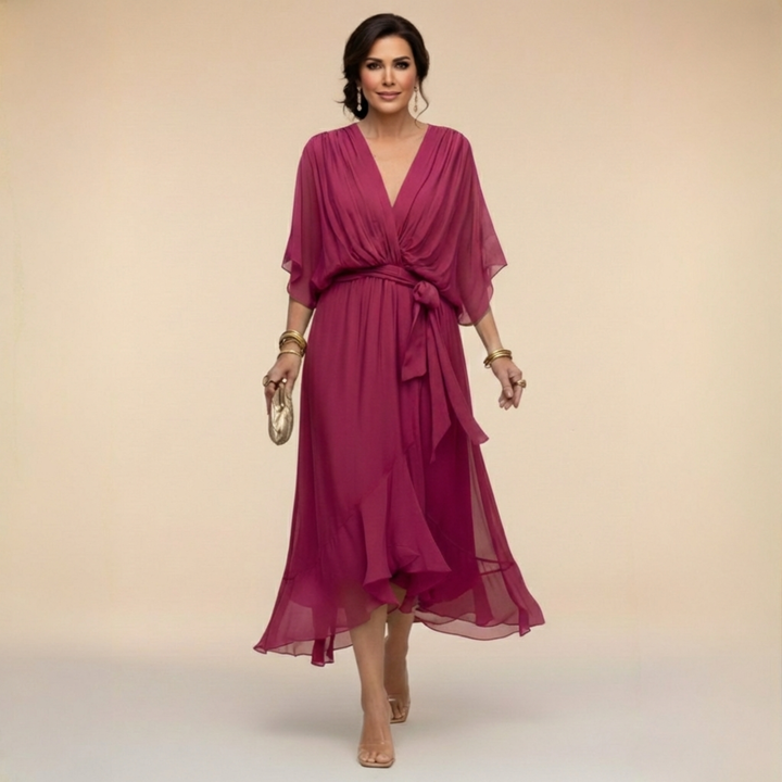 Woman wearing flowy V-neck dress outdoors