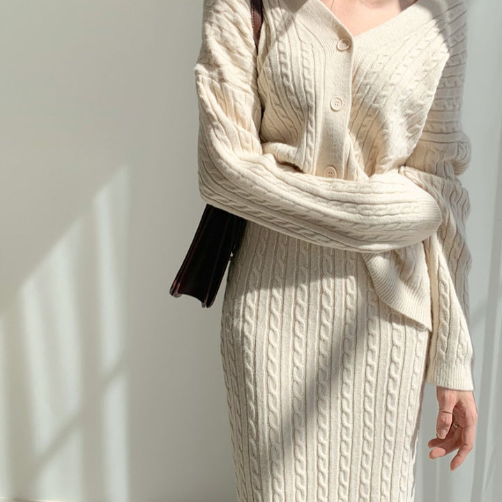 Woman wearing apricot knit sweater set with matching skirt