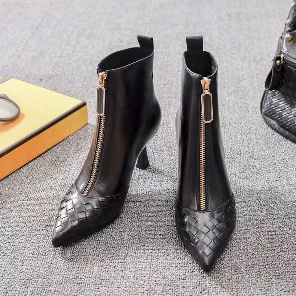 Black pointed toe stiletto ankle boots for women with mid heel