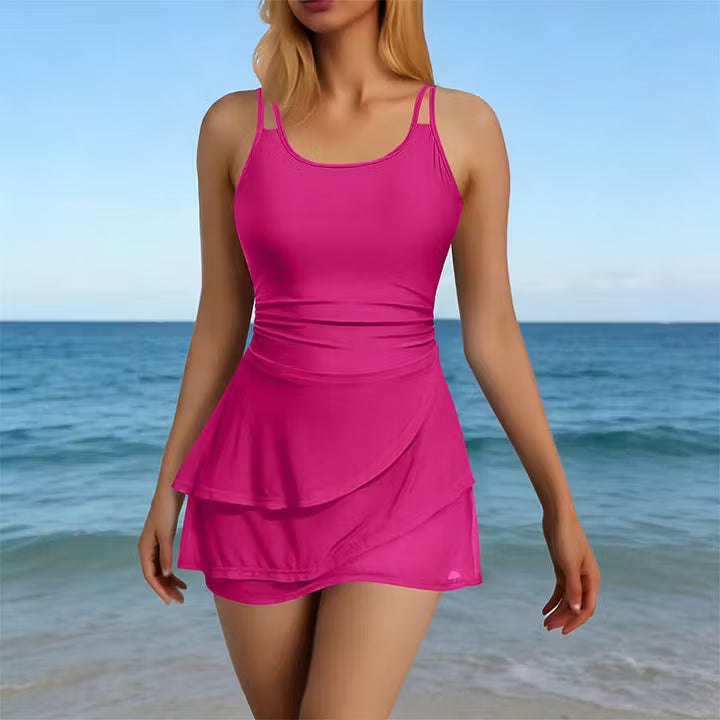 Woman wearing black sculpting two-strap swimsuit by the pool