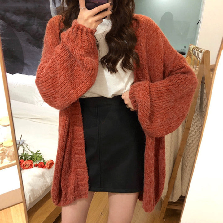 Woman wearing thick knit relaxed fit sweater