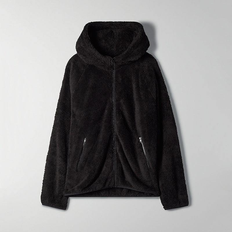 Woman wearing black zip-up hooded blazer front view