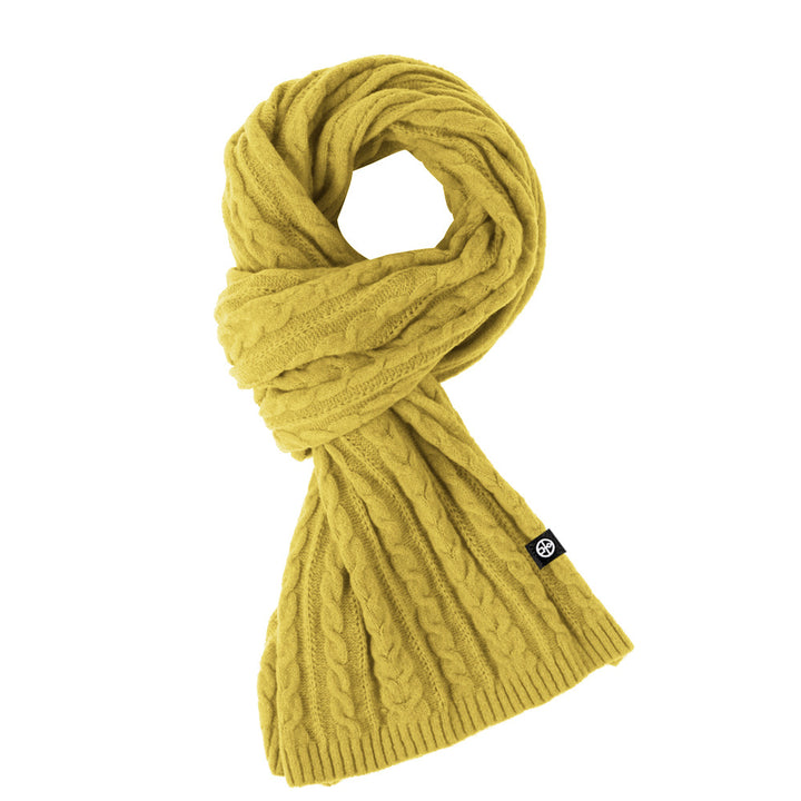 Woman wearing solid color long winter scarf outdoors